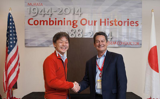 Norio Nakajima (left, director of Murata’s Communication business unit) and Jim Cable (right, Peregrine’s president & CEO) celebrate Murata’s acquisition of Peregrine. 