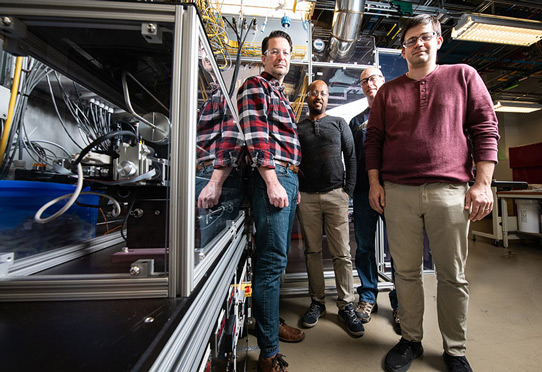 NREL researchers (from left to right) Aaron Ptak, Wondwosen Metaferia, David Guiling and Kevin Schulte are growing aluminium-containing materials for III-V solar cells using HVPE. Photo by Dennis Schroeder, NREL.