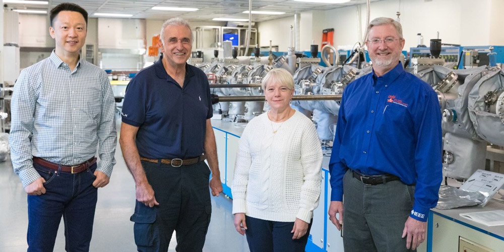 Zhong Chen (associate professor of electrical engineering); Greg Salamo (Distinguished Professor of physics); Shannon Davis (business and operations manager in the Department of Electrical Engineering); and Alan Mantooth, Distinguished Professor of electrical engineering,