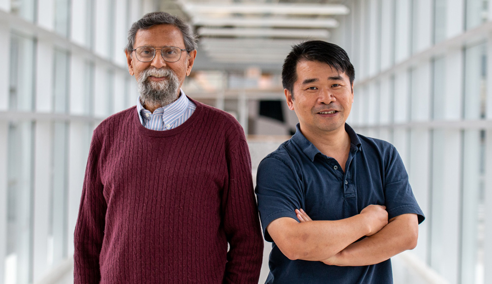 Liang Dong (right), new director of Iowa State University’s Microelectronics Research Center, replacing Vik Dalal (left) who has stepped down after leading the MRC for 22 years.