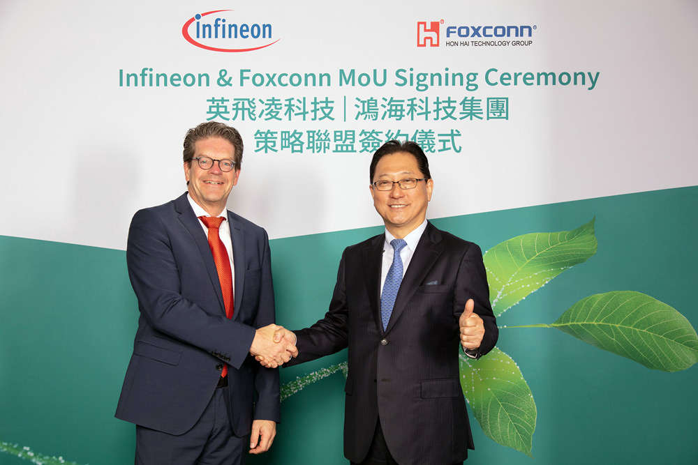From left to right: Peter Schiefer (president of Infineon Automotive Division) and Jun Seki (Foxconn’s chief strategy officer for EVs). 