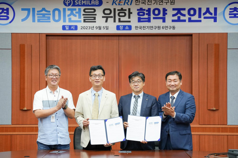 Second from left, Dr Bahng Wook, executive director of KERI’s Power Semiconductor Research Division; third from the left, Park Su-yong, CEO of Semilab Korea Co Ltd. 