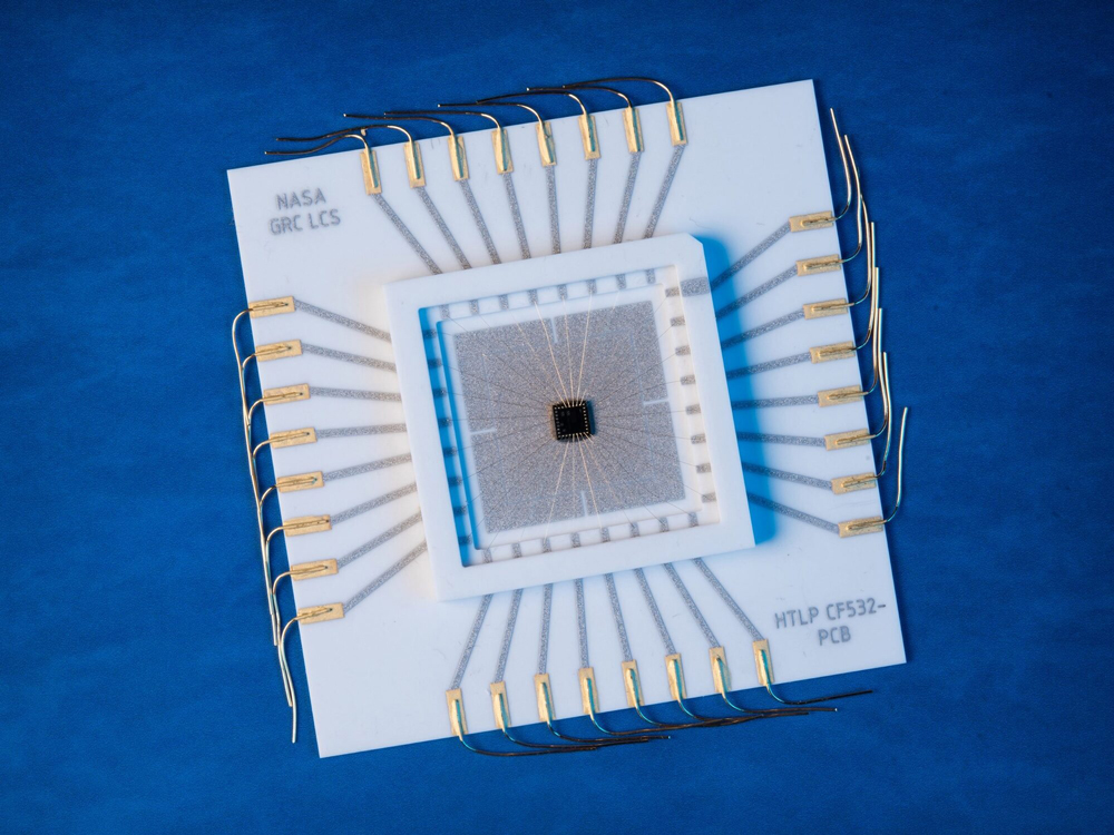 A silicon carbide chip in a high-temperature ceramic package. Image courtesy: NASA Glenn Research Center.