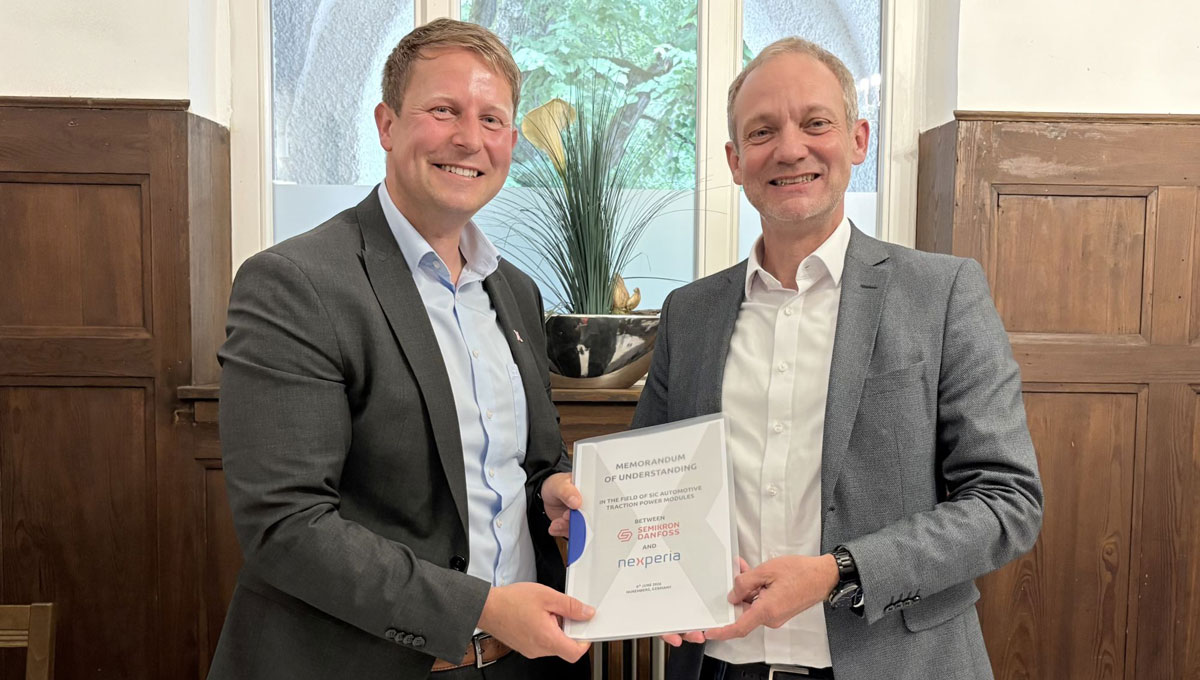 Nexperia’s interim CEO Stefan Tilger and Carsten Götte, senior VP of Semikron Danfoss’ Automotive Power Modules Division, sign an MoU to explore collaboration on SiC power modules for automotive applications.